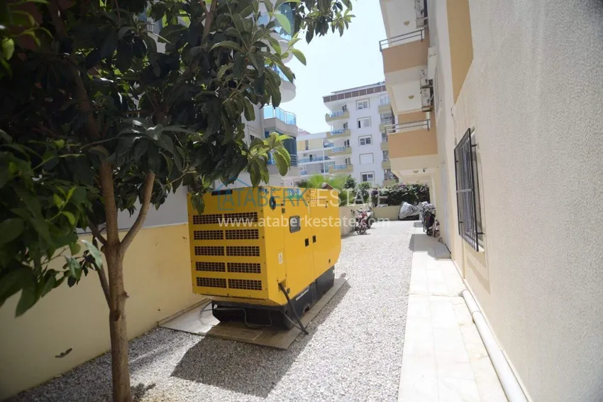 2+1 apartment in Mahmutlar with furniture, a separate kitchen and a glazed balcony  10 