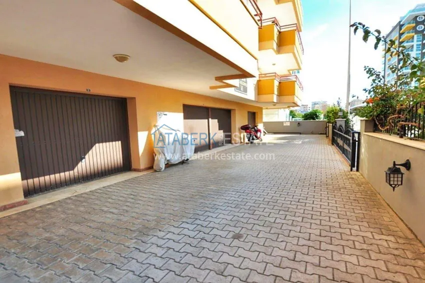 2+1 apartment in Mahmutlar with furniture, a separate kitchen and a glazed balcony  11 