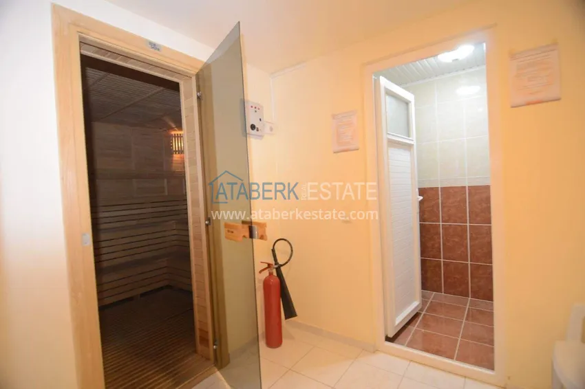 2+1 apartment in Mahmutlar with furniture, a separate kitchen and a glazed balcony  16 