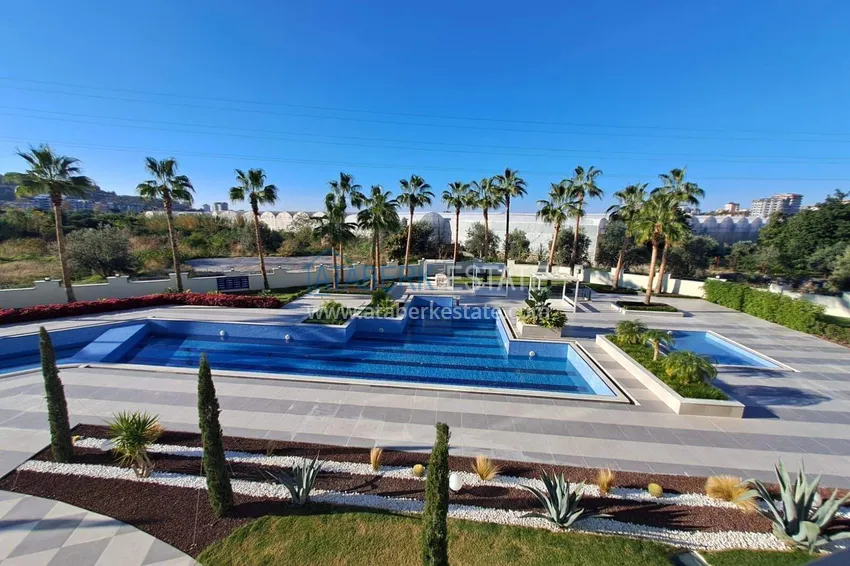 Purchase 1+1 apartment with appliances in Gazipasa - south side, residence with infrastructure 12 