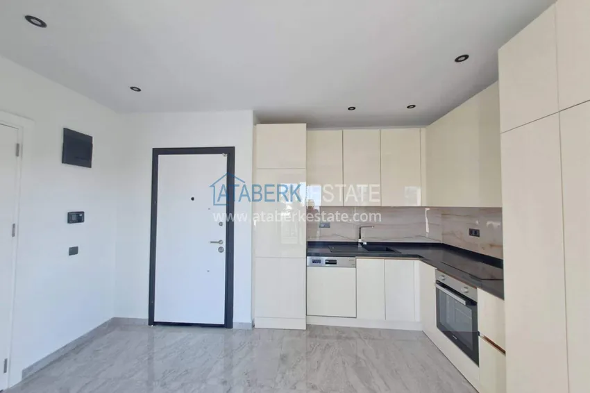 Purchase 1+1 apartment with appliances in Gazipasa - south side, residence with infrastructure 1 