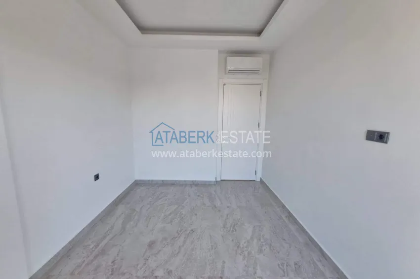 Purchase 1+1 apartment with appliances in Gazipasa - south side, residence with infrastructure 7 
