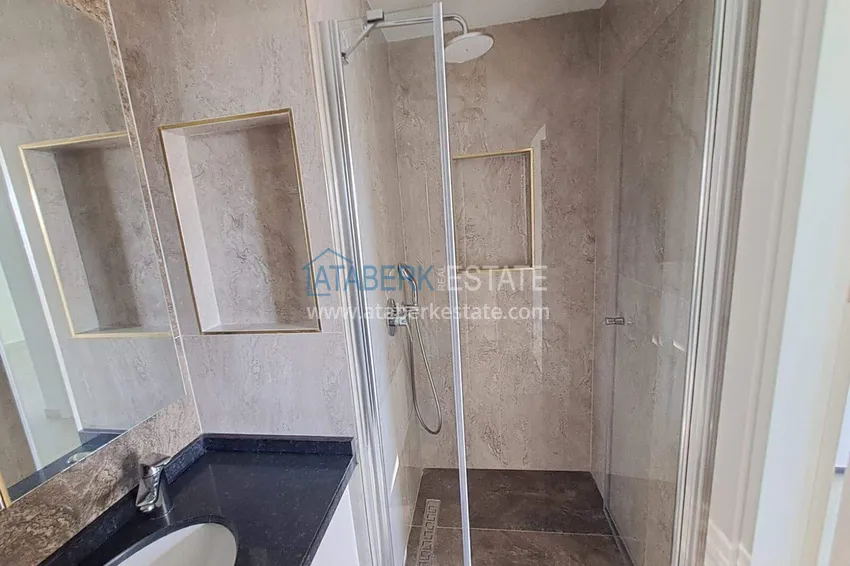 Purchase 1+1 apartment with appliances in Gazipasa - south side, residence with infrastructure 9 