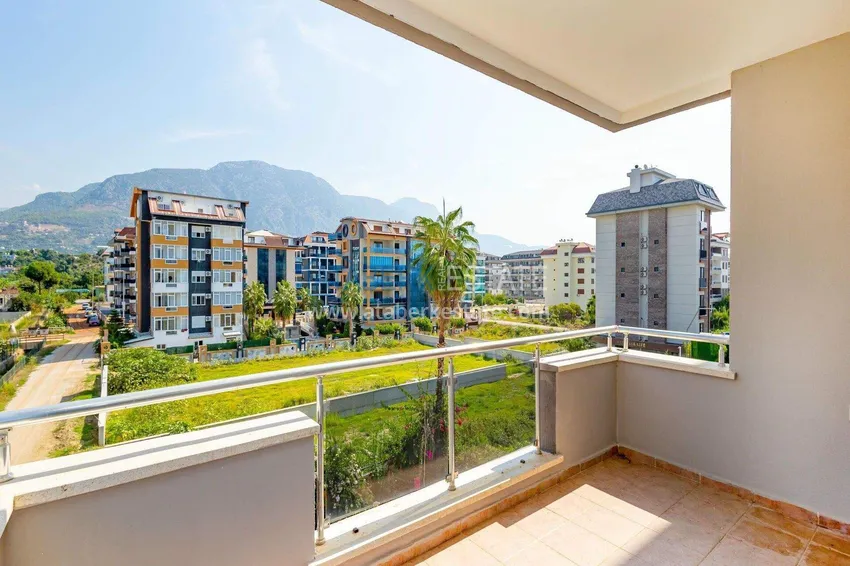 Purchase Apartment 1+1 in the Kestel area on the first line — furnished and with sea views 12 
