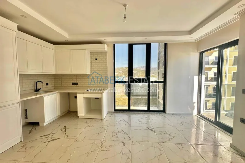 Purchase  1+1 apartment in Demirtas with sea view - real estate in Alanya with a fine finish 3 