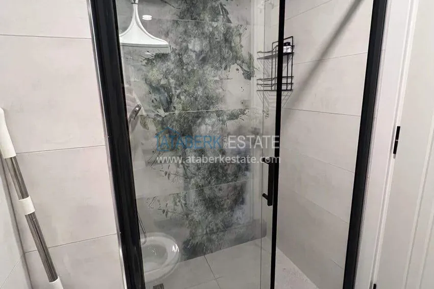 Purchase  1+1 apartment for rent in Mahmutlar — furnished and with views of the A40 mountains 10 