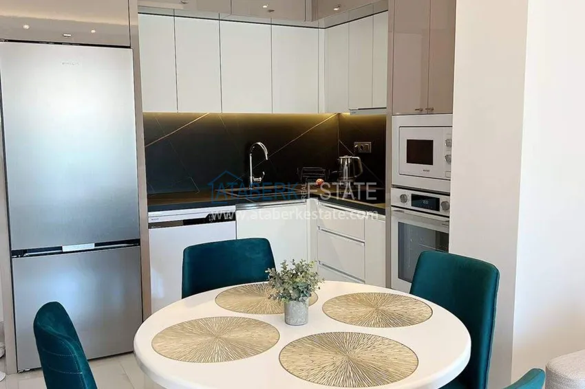 Purchase  1+1 apartment for rent in Mahmutlar — furnished and with views of the A40 mountains 2 