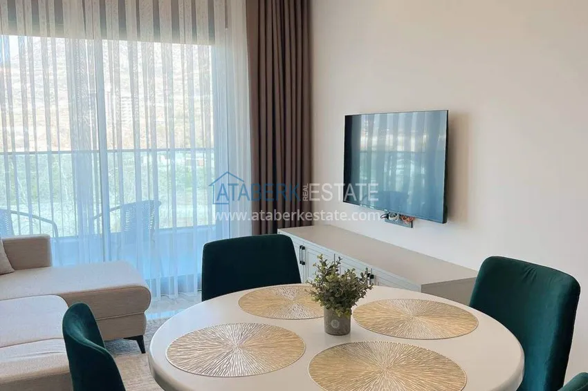 Purchase  1+1 apartment for rent in Mahmutlar — furnished and with views of the A40 mountains 3 