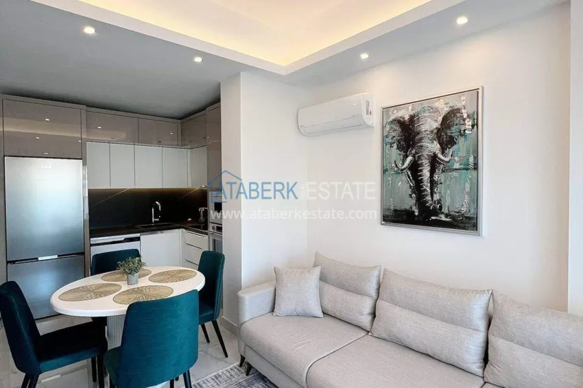 Purchase  1+1 apartment for rent in Mahmutlar — furnished and with views of the A40 mountains 4 