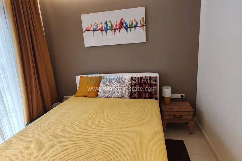 Purchase  1+1 apartment with sea view in the Oba area - first line, furnished, suitable for a residence permit 11 