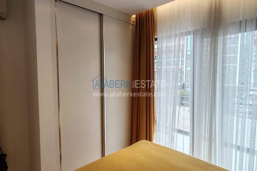 Purchase  1+1 apartment with sea view in the Oba area - first line, furnished, suitable for a residence permit 13 