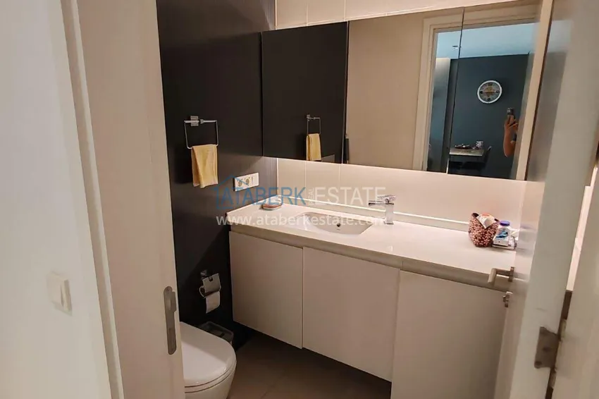 Purchase  1+1 apartment with sea view in the Oba area - first line, furnished, suitable for a residence permit 14 