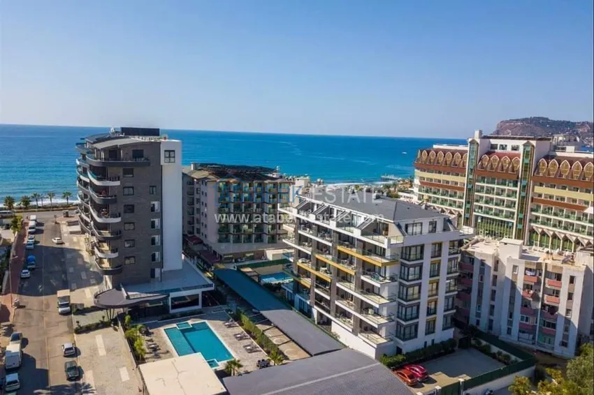 1+1 apartment with sea view in the Oba area - first line, furnished, suitable for a residence permit 2 