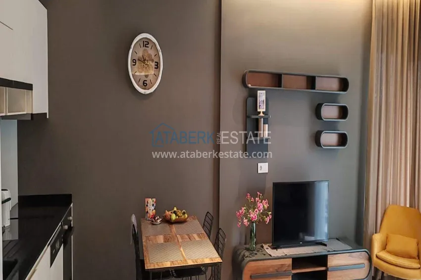 Purchase  1+1 apartment with sea view in the Oba area - first line, furnished, suitable for a residence permit 2 