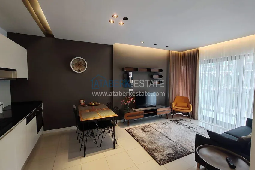 Purchase  1+1 apartment with sea view in the Oba area - first line, furnished, suitable for a residence permit 3 