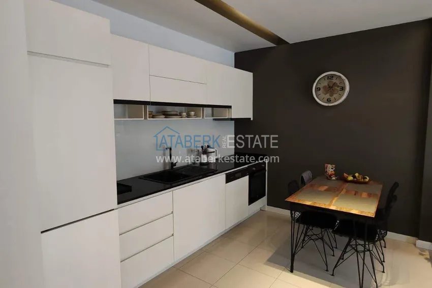 Purchase  1+1 apartment with sea view in the Oba area - first line, furnished, suitable for a residence permit 4 