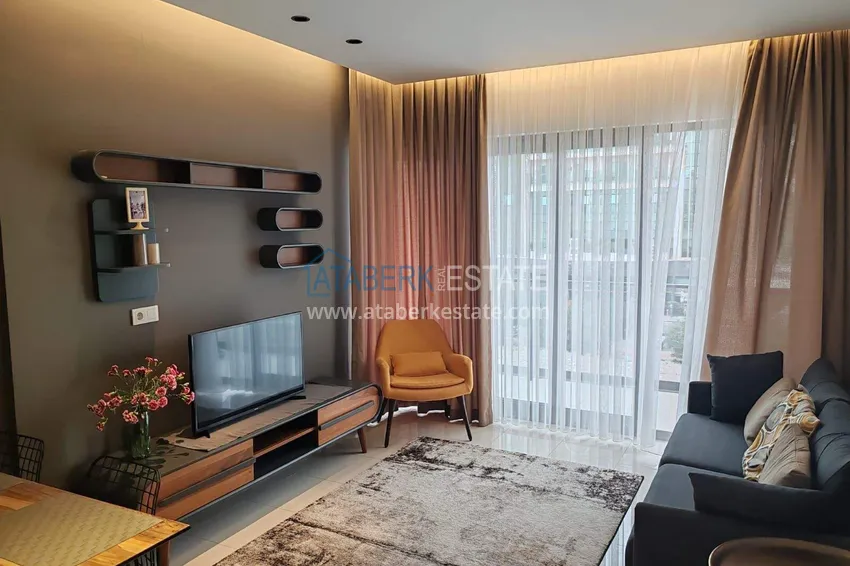 Purchase  1+1 apartment with sea view in the Oba area - first line, furnished, suitable for a residence permit 6 