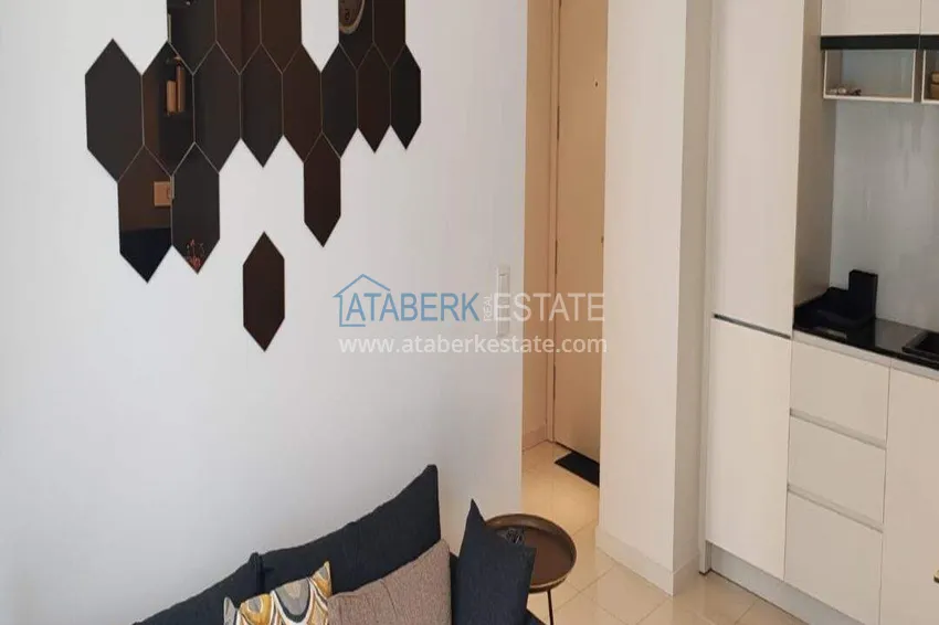 Purchase  1+1 apartment with sea view in the Oba area - first line, furnished, suitable for a residence permit 7 