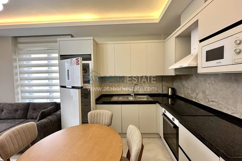 Purchase 1+1 apartment with new furniture in Mahmutlar - 400 meters from the sea, Ataturk Street 6 