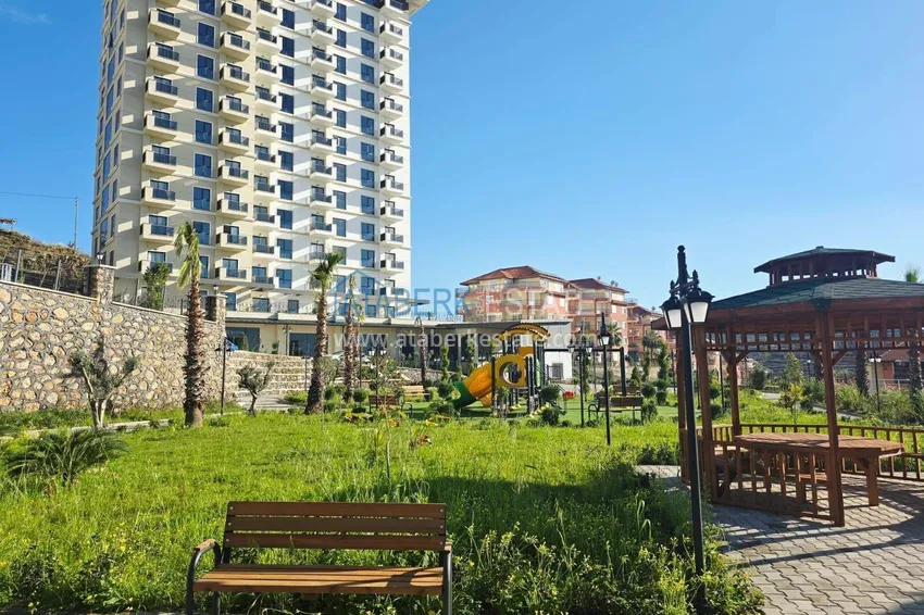 1+1 apartment with mountain views in Mahmutlar - a new residential complex with a transfer to the sea 14 