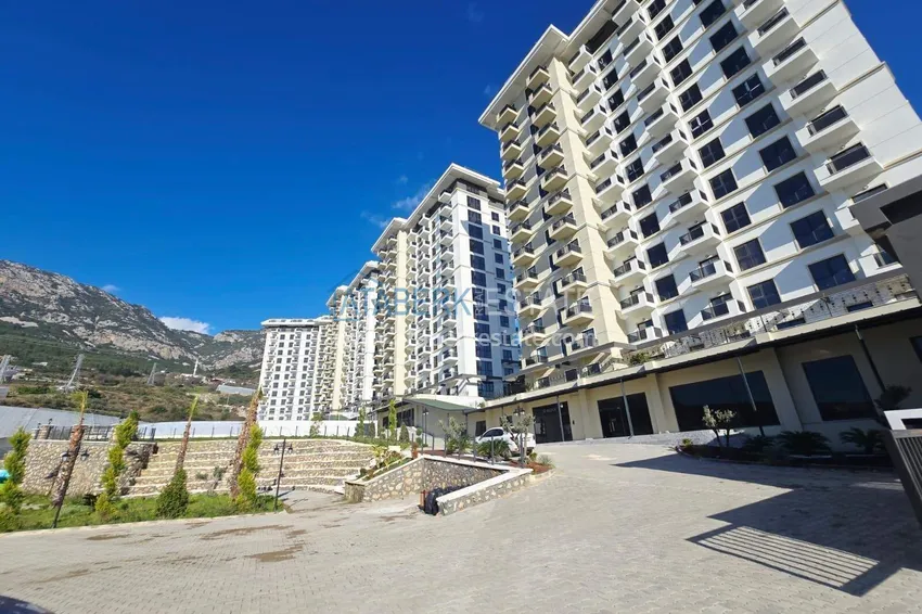 1+1 apartment with mountain views in Mahmutlar - a new residential complex with a transfer to the sea 18 