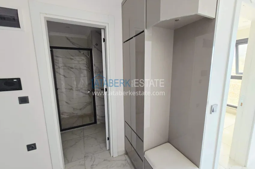 Purchase 1+1 apartment with mountain views in Mahmutlar - a new residential complex with a transfer to the sea 1 