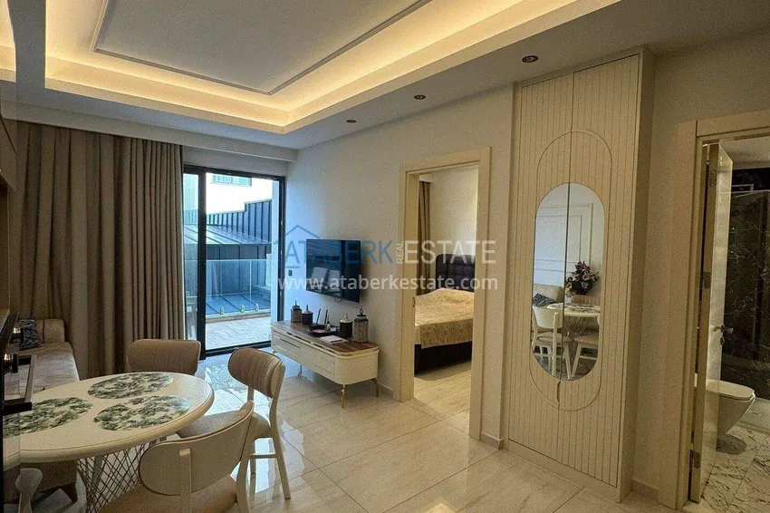Purchase Apartment 1+1 on the first line in Mahmutlar — furnished and with sea views in a five-star hotel-level complex 1 