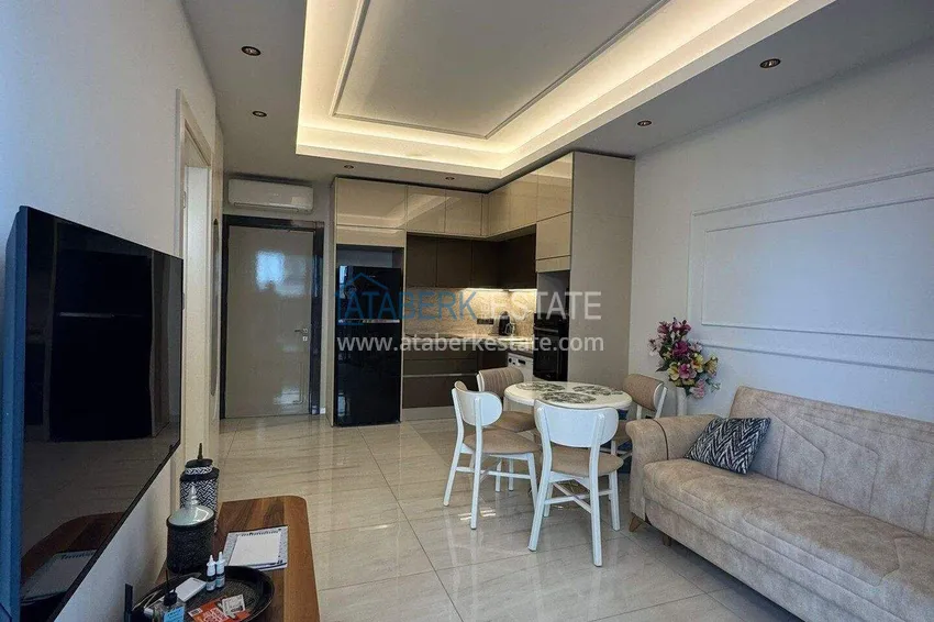 Purchase Apartment 1+1 on the first line in Mahmutlar — furnished and with sea views in a five-star hotel-level complex 2 