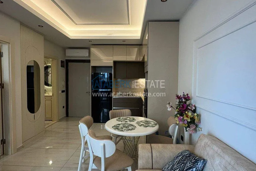 Purchase Apartment 1+1 on the first line in Mahmutlar — furnished and with sea views in a five-star hotel-level complex 3 