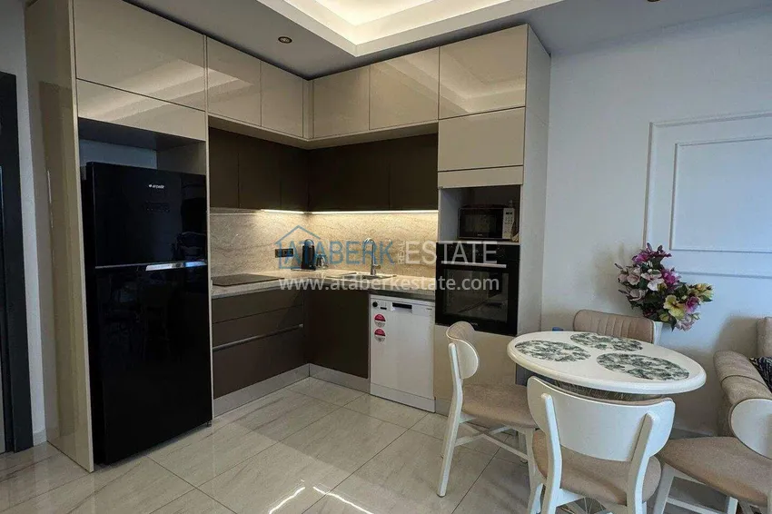 Purchase Apartment 1+1 on the first line in Mahmutlar — furnished and with sea views in a five-star hotel-level complex 4 