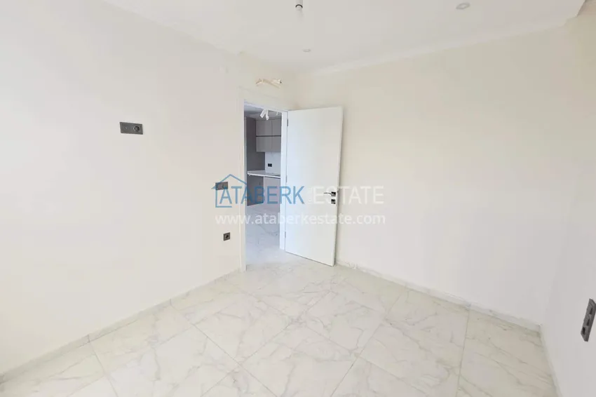 Purchase 1+1 apartment with mountain views in Mahmutlar - a new residential complex with a transfer to the sea 6 