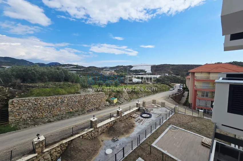 Purchase 1+1 apartment with mountain views in Mahmutlar - a new residential complex with a transfer to the sea 9 