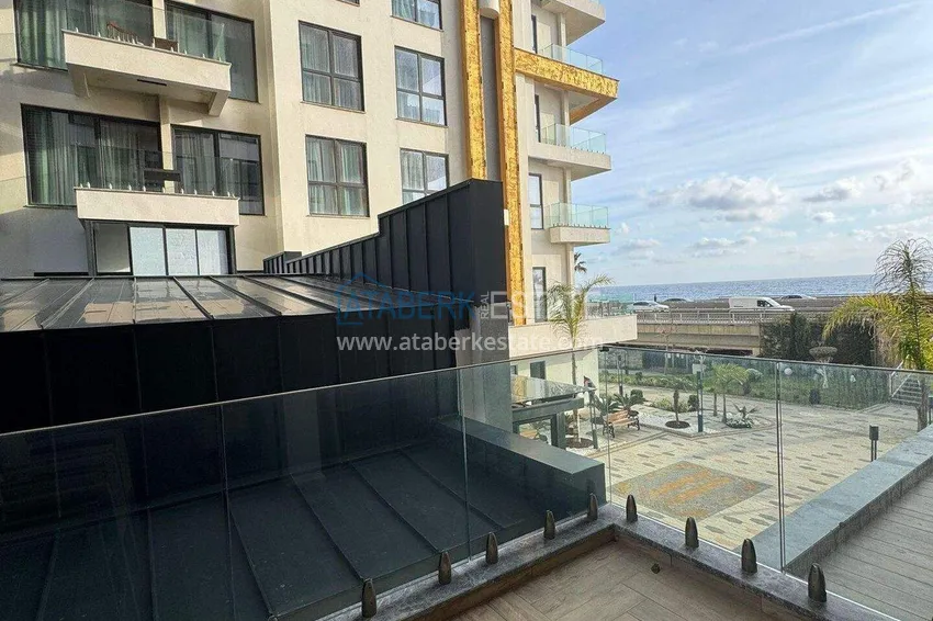 Purchase Apartment 1+1 on the first line in Mahmutlar — furnished and with sea views in a five-star hotel-level complex 9 