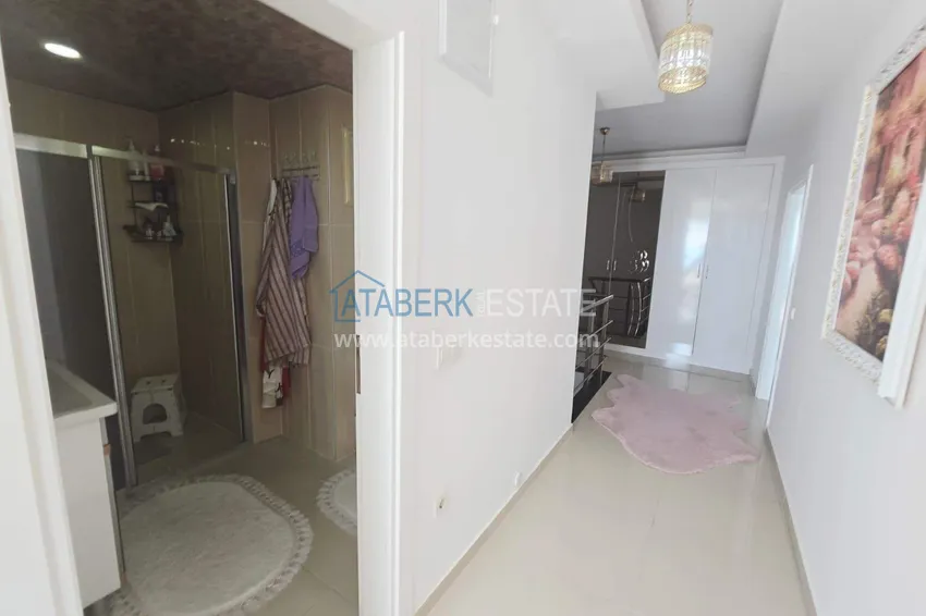 Purchase 3+1 duplex apartment with furniture in Mahmutlar — two glazed balconies and panoramic sea views 23 