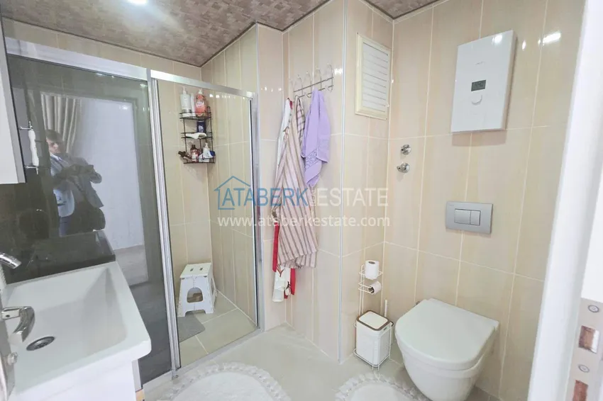 Purchase 3+1 duplex apartment with furniture in Mahmutlar — two glazed balconies and panoramic sea views 24 