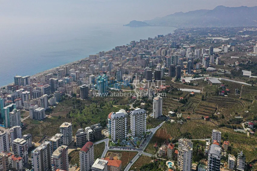 Finished two-bedroom apartment in a complex under completion in Mahmutlar 2 