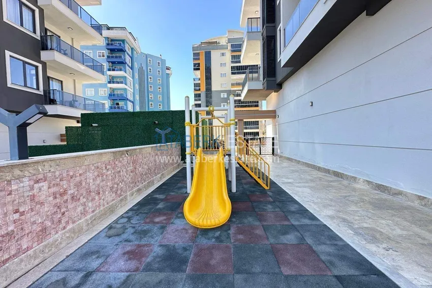 Finished two-bedroom apartment in a complex under completion in Mahmutlar 6 