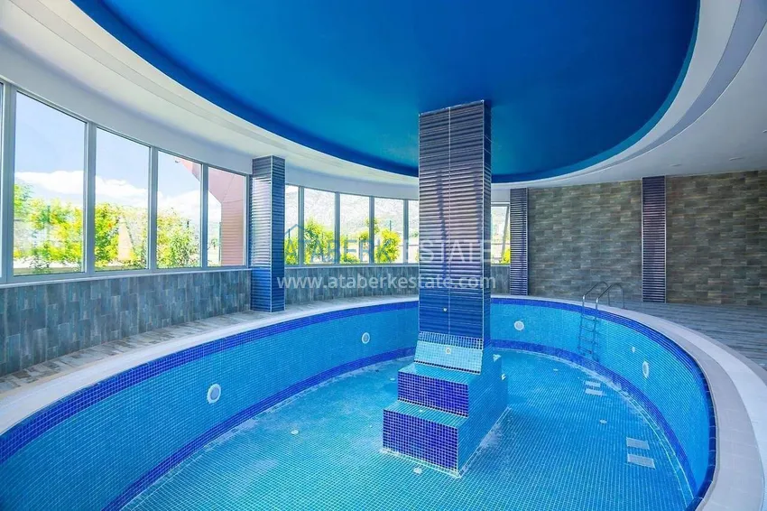 Apartment 1+1 in the center of Mahmutlar - on the 12th floor with furniture and mountain views 18 