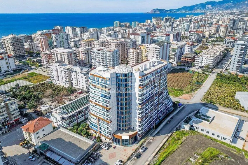 Apartment 1+1 in the center of Mahmutlar - on the 12th floor with furniture and mountain views 3 