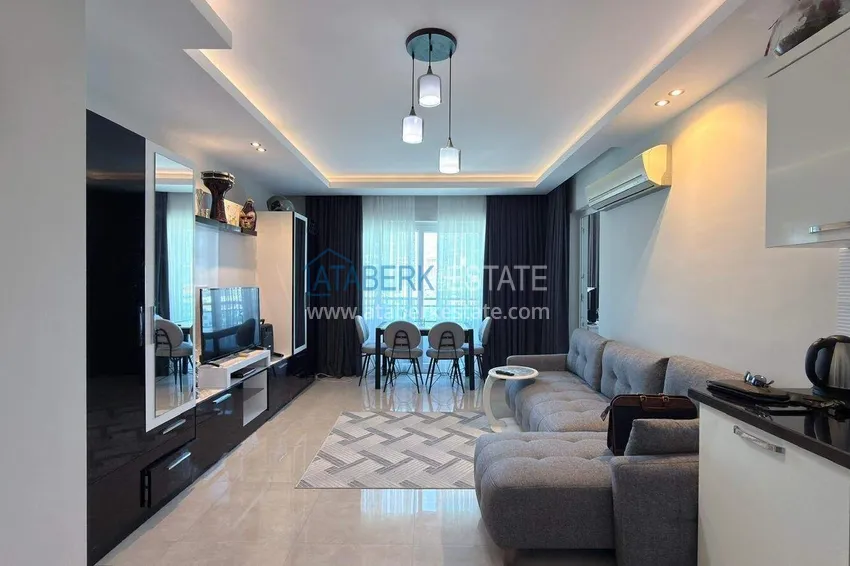 Purchase Apartment 1+1 in the center of Mahmutlar - on the 12th floor with furniture and mountain views 4 