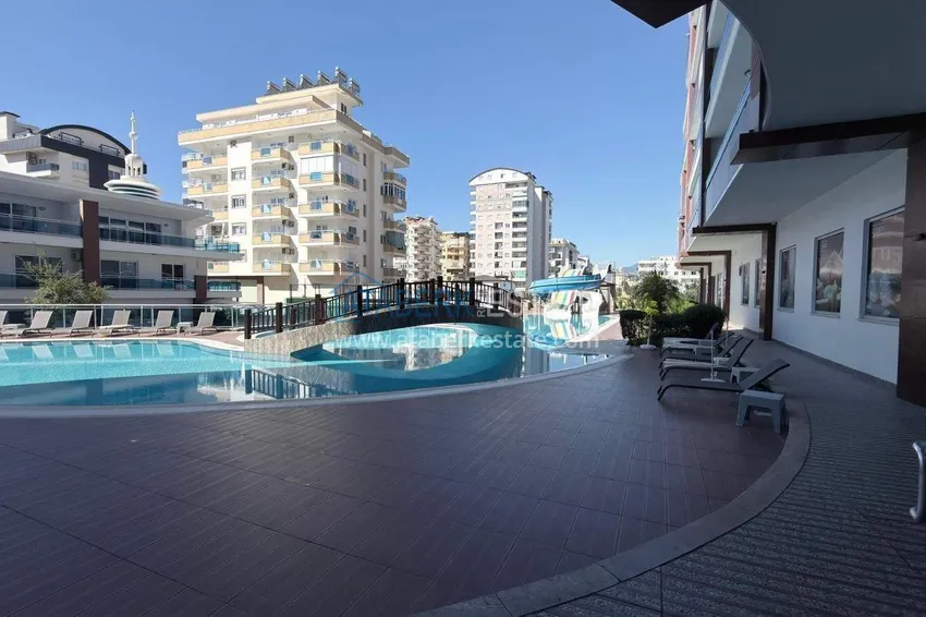 Apartment 1+1 in the center of Mahmutlar - on the 12th floor with furniture and mountain views 6 