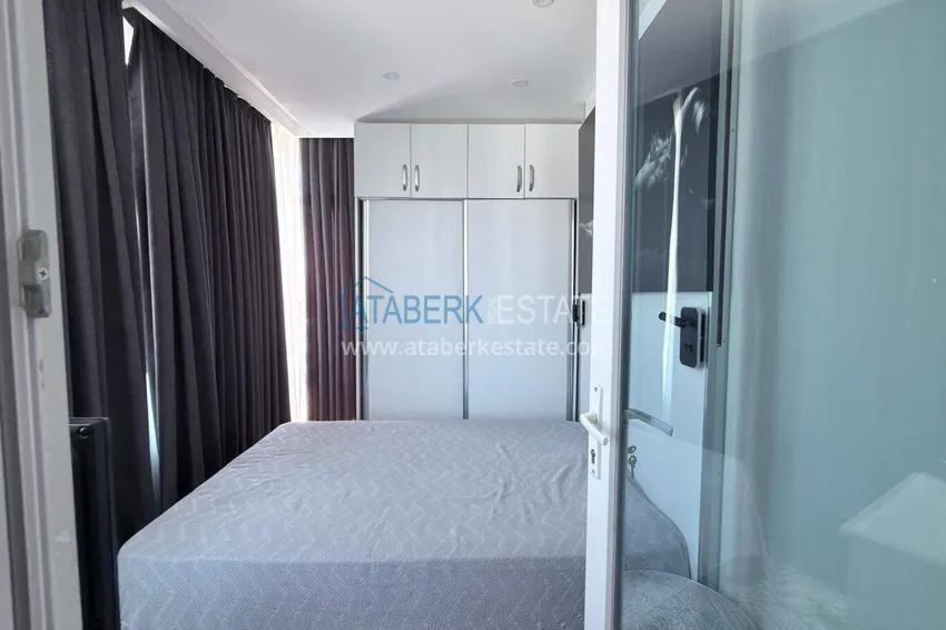 Purchase Apartment 1+1 in the center of Mahmutlar - on the 12th floor with furniture and mountain views 7 