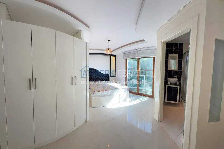 Purchase 2+1 apartment on the first line in Alanya, Kestel district — furnished and with sea views 12