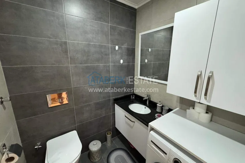 Purchase  One bedroom apartment with furniture and a glazed balcony in Mahmutlar, Alanya 15 