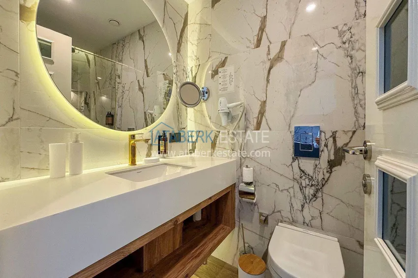 Purchase 1+1 apartment with sea view in Konakli - hotel format 5 ★, short-term rent, suitable for a residence permit 16 