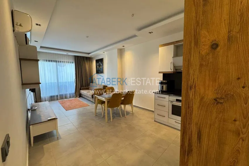 Purchase  One bedroom apartment with furniture and a glazed balcony in Mahmutlar, Alanya 4 