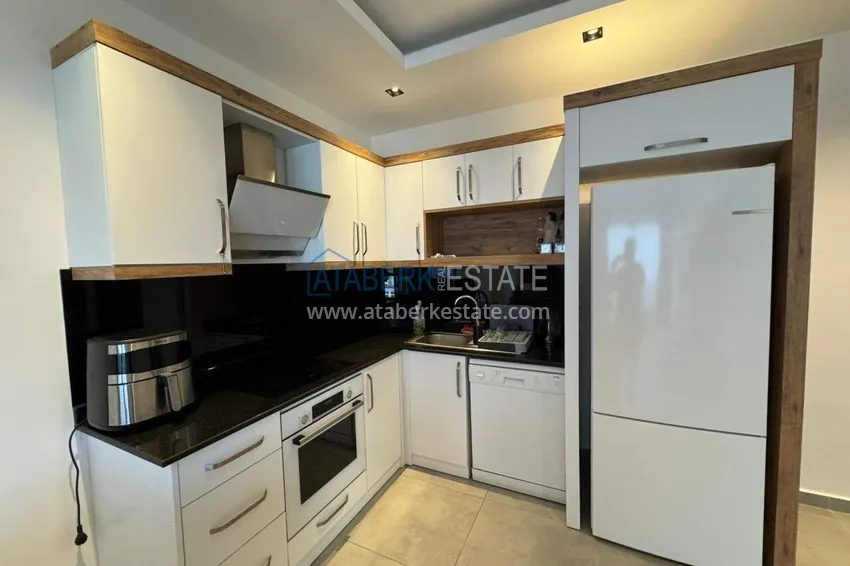 Purchase  One bedroom apartment with furniture and a glazed balcony in Mahmutlar, Alanya 6 