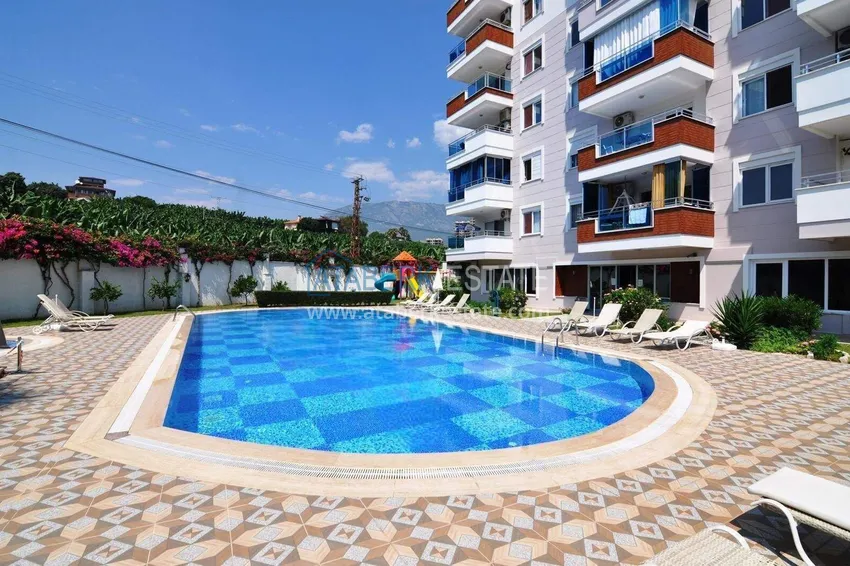 1+1 apartment in Mahmutlar — new furniture, 70 m², glazed balcony, sea and mountain views 2 