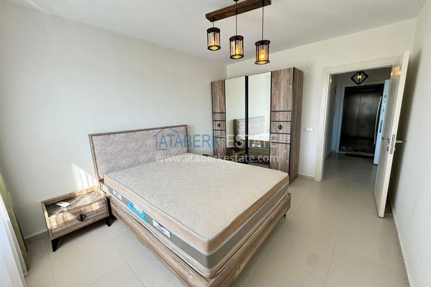 Purchase 1+1 apartment in Mahmutlar — new furniture, 70 m², glazed balcony, sea and mountain views 9 