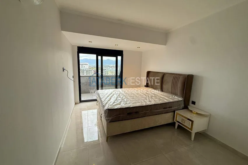 Purchase 2+1 duplex in Mahmutlar with furniture and sea and mountain views 10 